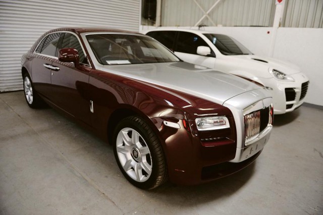 The Rolls-Royce Ghost that Zimbabwean property mogul Frank Buyanga bought in 2010, with Czech fugitive Radovan Krejcir’s modified Porsche Cayenne behind it. Both cars went under the hammer this week with a host of other exotic vehicles seized by the taxman.