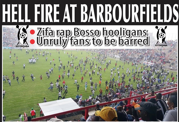 CITY OF MADNESS . . . Highlanders fans invade the pitch just after Sunday’s Bob 91 play-off match against CAPS United at Barbourfields as hooliganism once again reared its ugly head in domestic football. — Picture by Chipo Sabeta