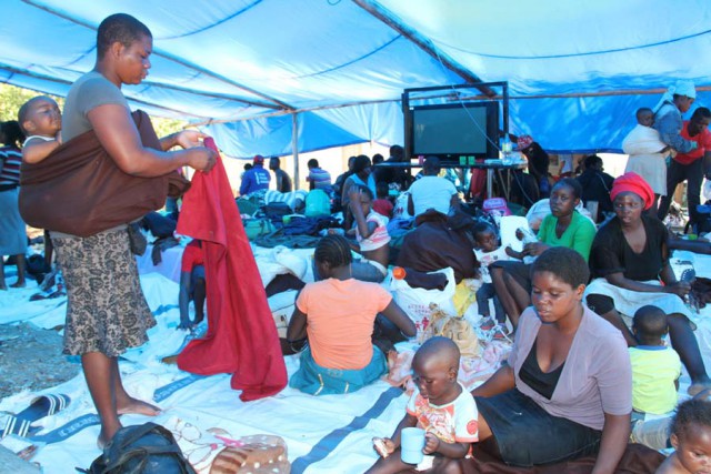 Zimbabweans who have been affected by xenophobia in South Africa at the International Organisation for Migration Holding Centre in Beitbridge yesterday. — Picture by John Manzongo