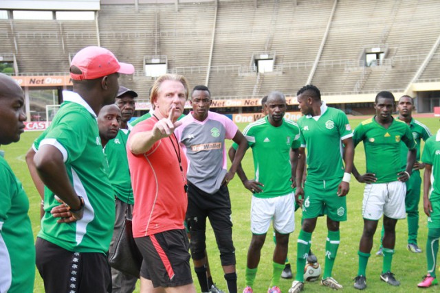 Caps United coach Mark Harrison (in red) stresses a point during yesterday’s training session at the National Sports Stadium. (Picture by Eddie Muzerengi)