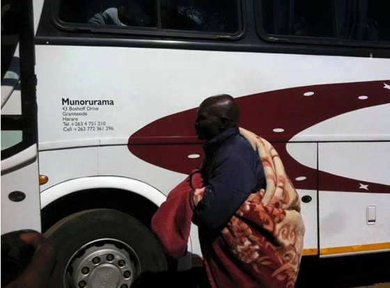 Zimbabwe national team coach Callisto Pasuwa (with blanket) seen here boarding a bus to Malawi last month for a match