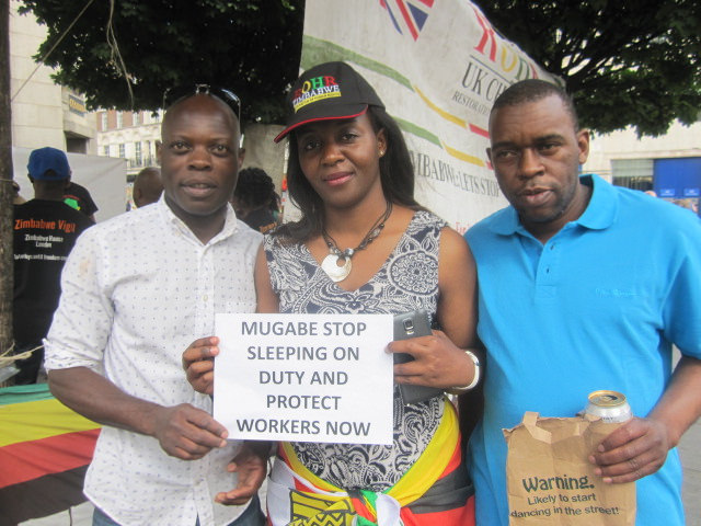 Members of the Zimbabwe Vigil protesting in London at the Zimbabwean Embassy