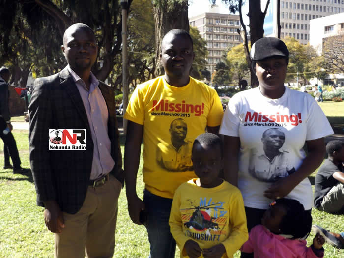 Itai Dzamara’s wife Sheffra (right) and his brother Patson (second right) seen with Itai’s two children