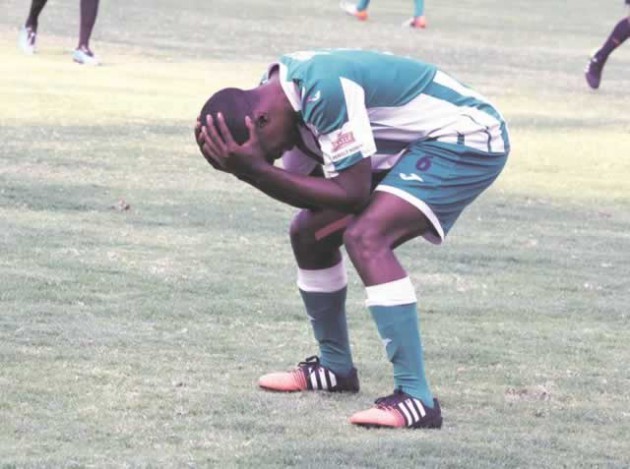 ON NO, NOT AGAIN . . . CAPS United right-back Hardlife Zvirekwi rues another missed chance during yesterday’s Castle Lager Premiership match against Dongo Sawmill at the National Sports Stadium. — (Picture by Tawanda Mudimu)