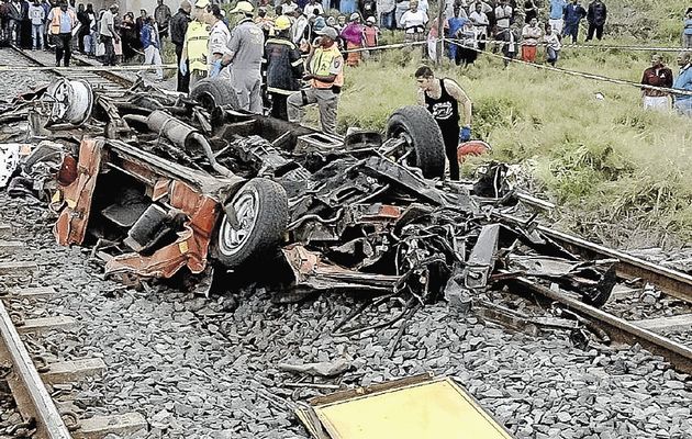 DEATH METAL: Fifteen people died and four were critically injured when a taxi collided with a train in the Shaka's Head area of the North Coast yesterday Paramedics found people and debris spread over a large area (Image by: NETCARE 911)