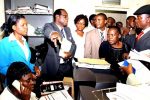 Dual citizenship: Mudede sued Registra-General Tobaiwa Mudede (in glasses)