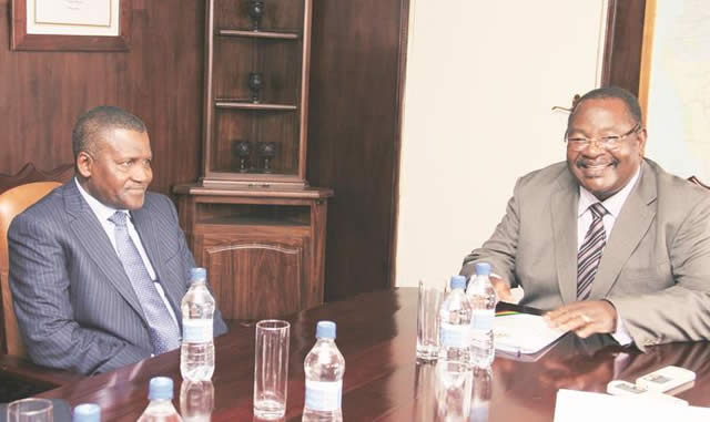Nigerian billionaire Mr Aliko Dangote who intends to invest billions in Zimbabwe meets Transport and Infrastructural Development Minister Obert Mpofu in Harare on Monday