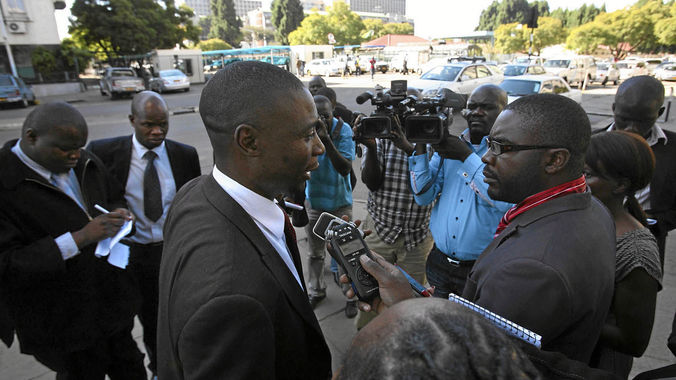Jealousy Mawarire being interviewed by journalists