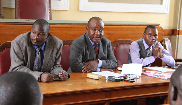 Harare deputy mayor Thomas Muzuva (left)