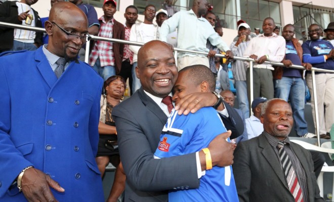 Dynamos chairman Kenny Mubaiwa and Webster Chikengezha (hugging Dynamos player)