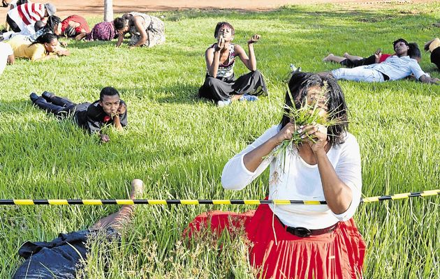 GRASS ROOTS: Members of the Rabboni Centre Ministries, under 'miracle man' pastor Lesego Daniel, eat grass as part of a ritual to show that humans can be controlled by the spirit of God