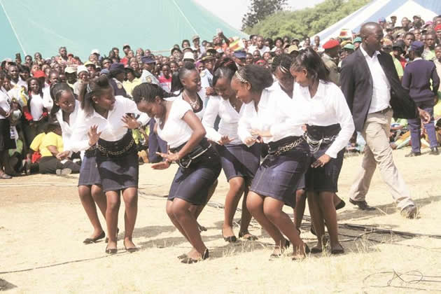 Nine daughters of jailed End Time Message leader Robert Martin Gumbura dance during their performance at the rally