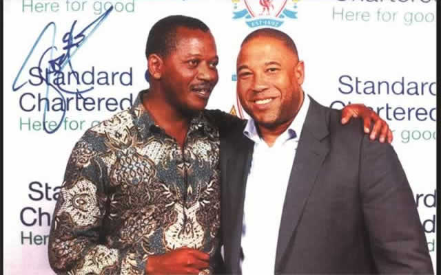 ZIFA presidential candidate Leslie Gwindi seen here with Liverpool legend John Barnes in this file picture
