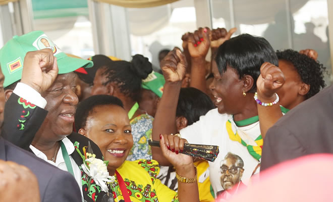 Vice President Emmerson Mnangagwa (left)
