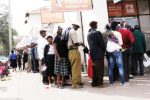 Zimbabwe pensioners face delay in payments amid currency row Pensioners queue to withdraw their cash at a Bulawayo bank yesterday