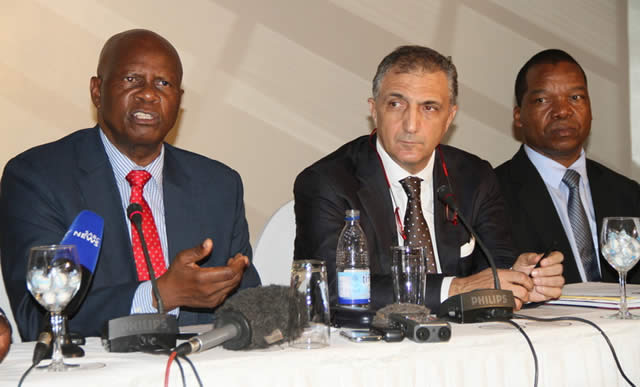 Finance and Economic Development Minister Patrick Chinamasa (left) addresses guests while IMF Head of Mission Mr Domenico Fanizza and Reserve Bank of Zimbabwe Governor Dr John Mangudya (right) look on during the wrap-up meeting and dialogue at the conclusion of the first review of the IMF Staff Monitored Programme (Picture by Innocent Makawa)