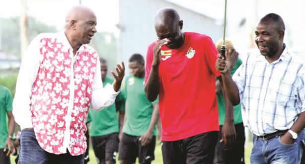 Zifa president Philip Chiyangwa shares a lighter moment with Warriors coach Callisto Pasuwa