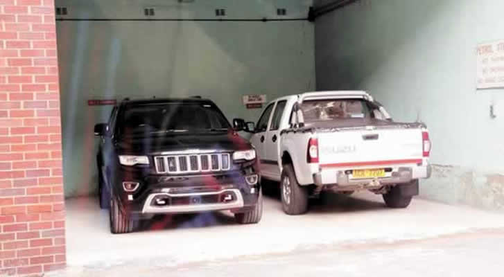 CENTRE OF A STORM . . . The Jeep Cherokee (left) bought for Harare Central Hospital chief executive, Mrs Peggy Zvavamwe, for a reported $80 000, when the hospital is struggling to buy pain killers