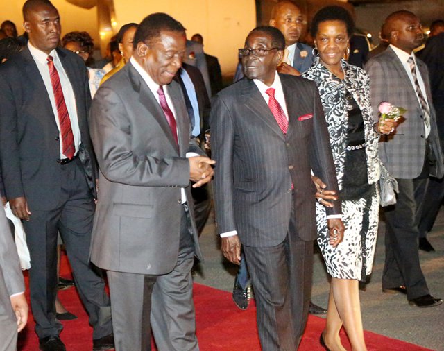President Mugabe and the First Lady Grace Mugabe are welcomed at Harare International Airport by Vice President Emmerson Mnangagwa on their return from their annual vacation. — (Picture by Believe Nyakudjara)