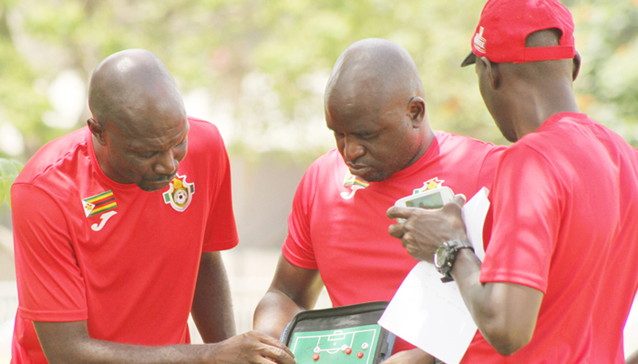 4-2-3-1 FORMATION . . . Warriors coach Kallisto Pasuwa (left) discusses some tactics with his assistants Saul Chaminuka and Nation Dube (centre) during a training session at the National Sports Stadium’s B Arena last week — Picture by Kudakwashe Huda