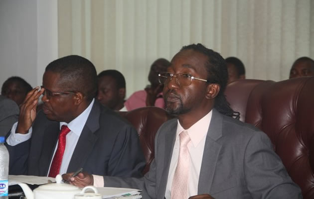 Youth and Empowerment Minister Patrick Zhuwao (right)