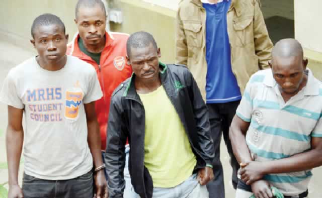 The four men held on suspicion of killing Shingai Dhliwayo after their court appearance in Bulawayo yesterday