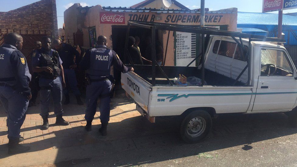 Police were escorting foreign shop owners away from some areas on Wednesday, saying they were not safe, EyeWitness news reports.