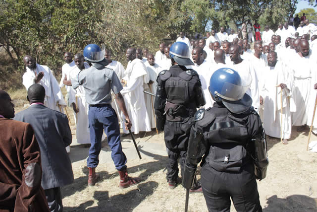Flashback: Riot Police and an apostolic congregation in a hostile confrontation in 2014