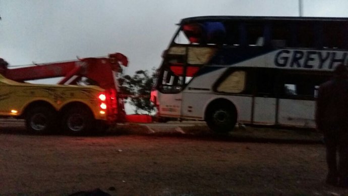 The Greyhound Bus being towed away