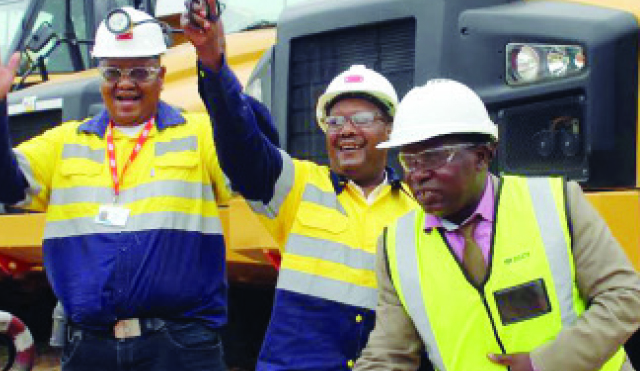 Lovemore Chihota (centre)
