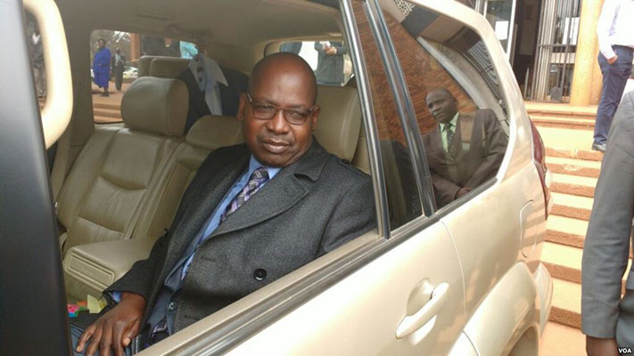 Suspended Prosecutor General Johannes Tomana was arrested as he was leaving the Harare Magistrates Court where he was appearing on charges of criminal abuse of office as a public officer. (Picture via VOA)