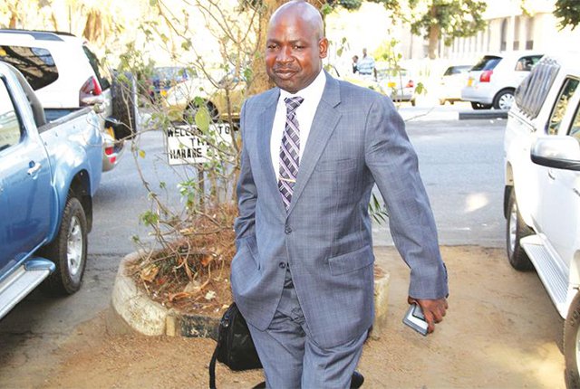 Suspended Prosecutor-General Johannes Tomana arrives at Harare Club Chambers yesterday for his disciplinary hearing before a three-member tribunal (Picture by Shelton Muchena)