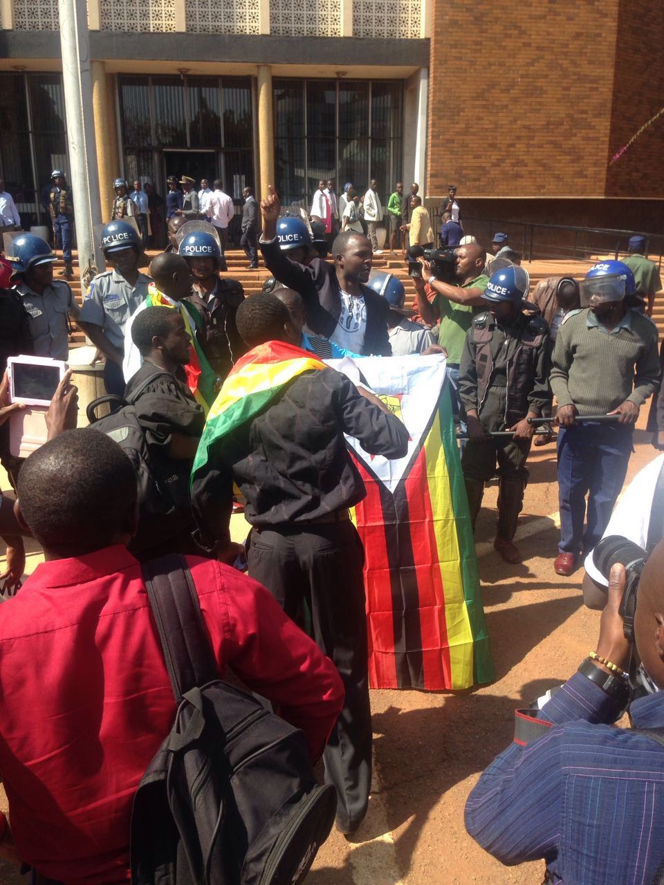 Patson Dzamara outside the court house on Monday