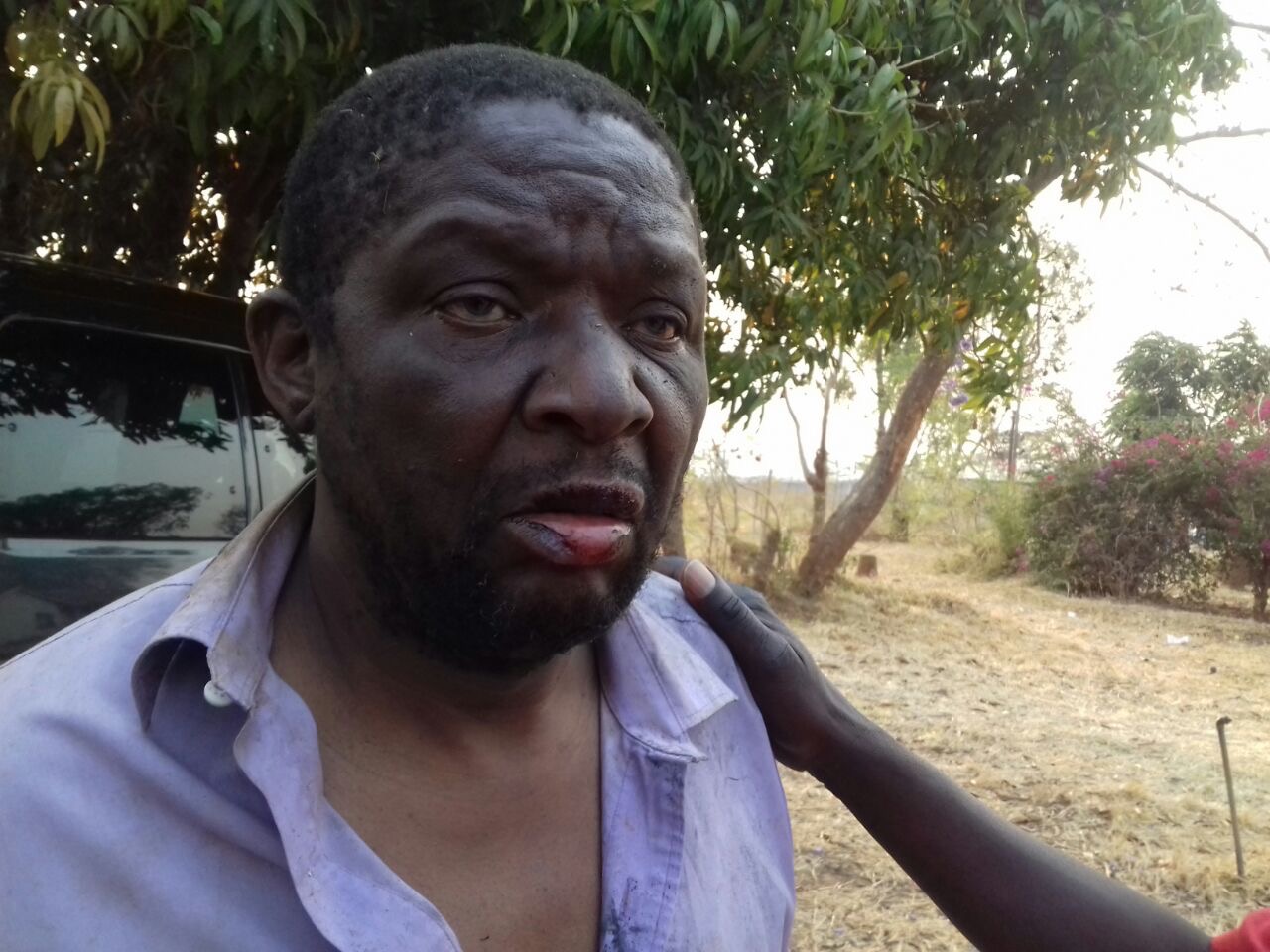 Retired Brigadier-General and former ambassador Agrippa Mutambara beaten up by Zanu-PF youth alongside his fellow ZimbabwePeople First colleagues at a farm in Guruve.