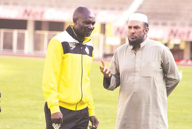 Warriors coach Callisto Pasuwa (left) and team manager Shariff Mussa