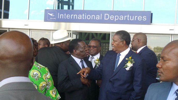 Vice Presidents Emmerson Mnangagwa and Phelekezela Mphoko chat. Picture by Garikai Mazara