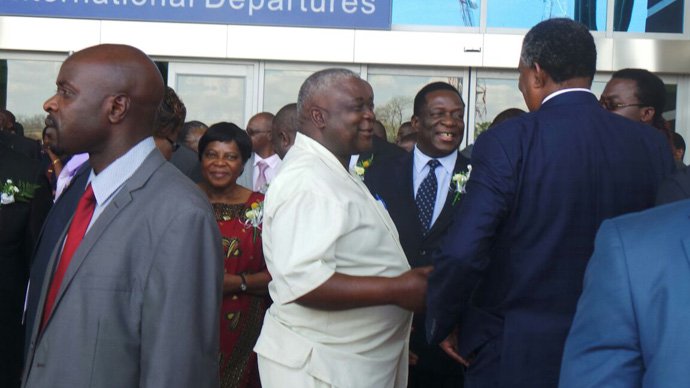 VPs Mnangagwa and Mphoko share a joke with MDC-T vice president Elias Mudzuri. Picture by Garikai Mazara