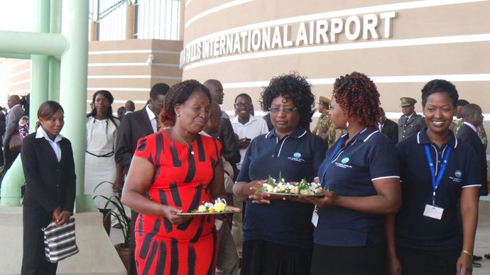 These ladies enjoy a snack at Victoria Falls Airport. Picture by Believe Nyakudyara