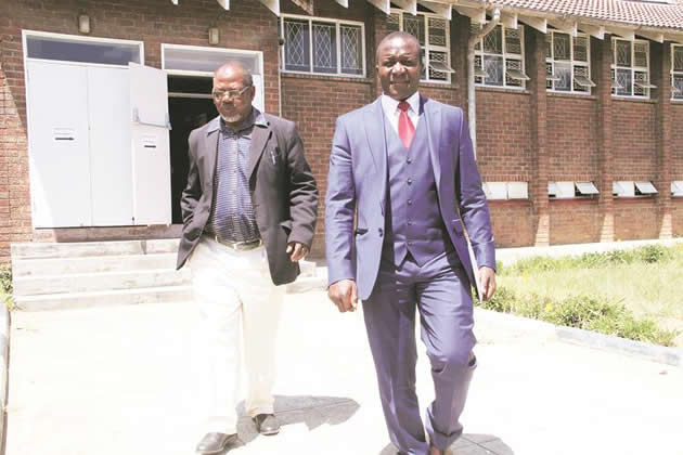 Wedza Zanu PF MP David Musabayana (right) seen here with Aeneas Chigwedere (left).
