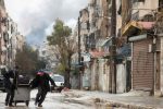 Syria conflict: Fierce fighting halts Aleppo evacuation