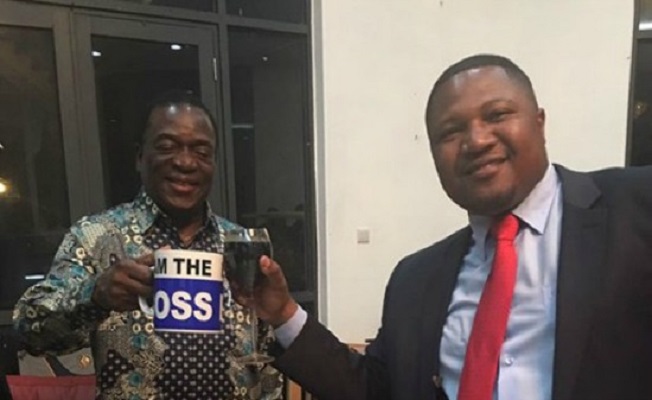 Then Vice President Emmerson Mnangagwa seen here with Energy Mutodi with the coffee mug that torched a political storm