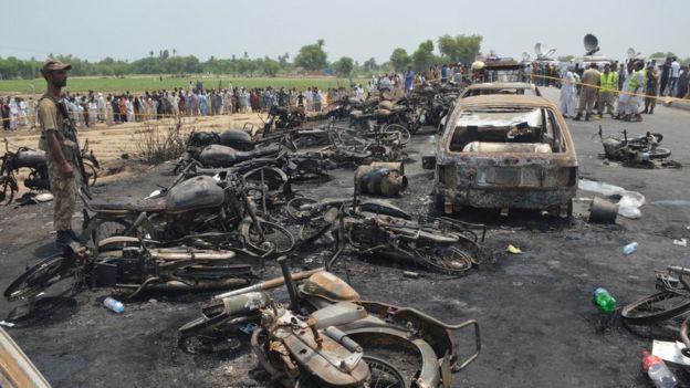 Charred motorbikes littered the road