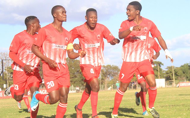 Yadah Stars players, led by skipper Jimmy Dzingai, celebrate the captain’s opening goal against CAPS United