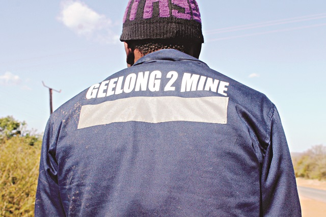 File picture of a person wearing Geelong 2 Mine work gear