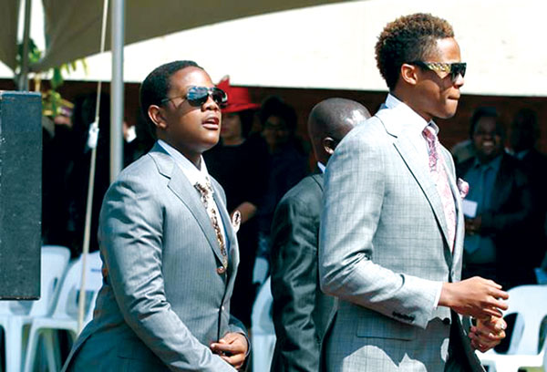 President Robert Mugabe's sons Bellarmine Chatunga (left) and Robert Jr