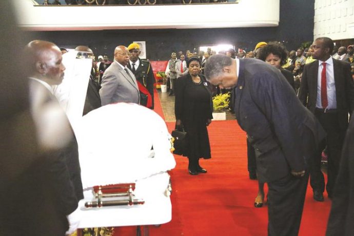 Vice President Phelekezela Mphoko leads mourners in viewing the body of national heroine Senator Shuvai Ben Mahofa, who was Minister of State for Masvingo Provincial Affairs, at Stodart Hall in Mbare before burial at the National Heroes Acre. — (Picture by Believe Nyakudjara)