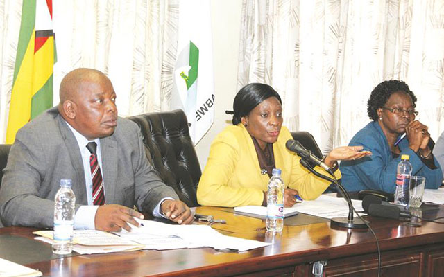 ZEC chairperson Justice Rita Makarau address a media briefing while flanked by deputy chairperson Mr Emmanuel Magade (left) and chief elections officer Mrs Constance Chigwamba (right) in Harare. -(Picture by Innocent Makawa)
