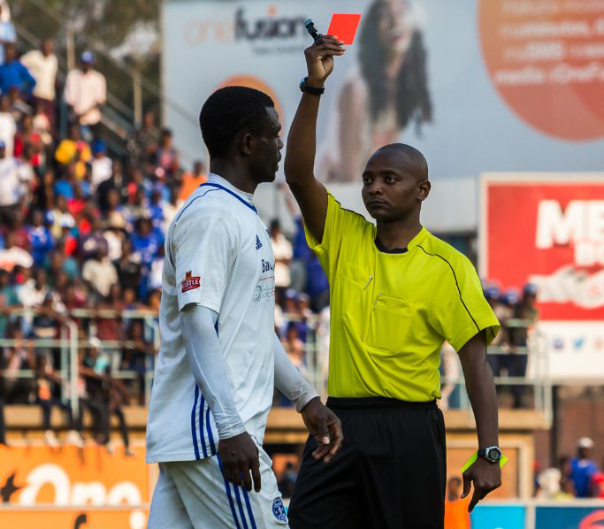 Dynamos striker Christian Epoupa Ntouba getting his marching orders from referee Arnold Ncube