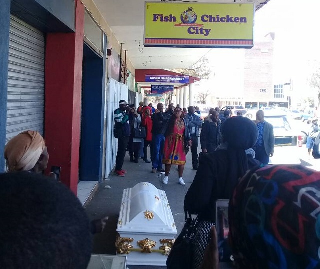 Tawanda “Mapecca” Moyo’s coffin at his alleged “killer’s” shop in the city centre