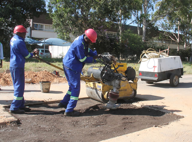Bulawayo City Council workers on road maintenance along Plumtree road recently